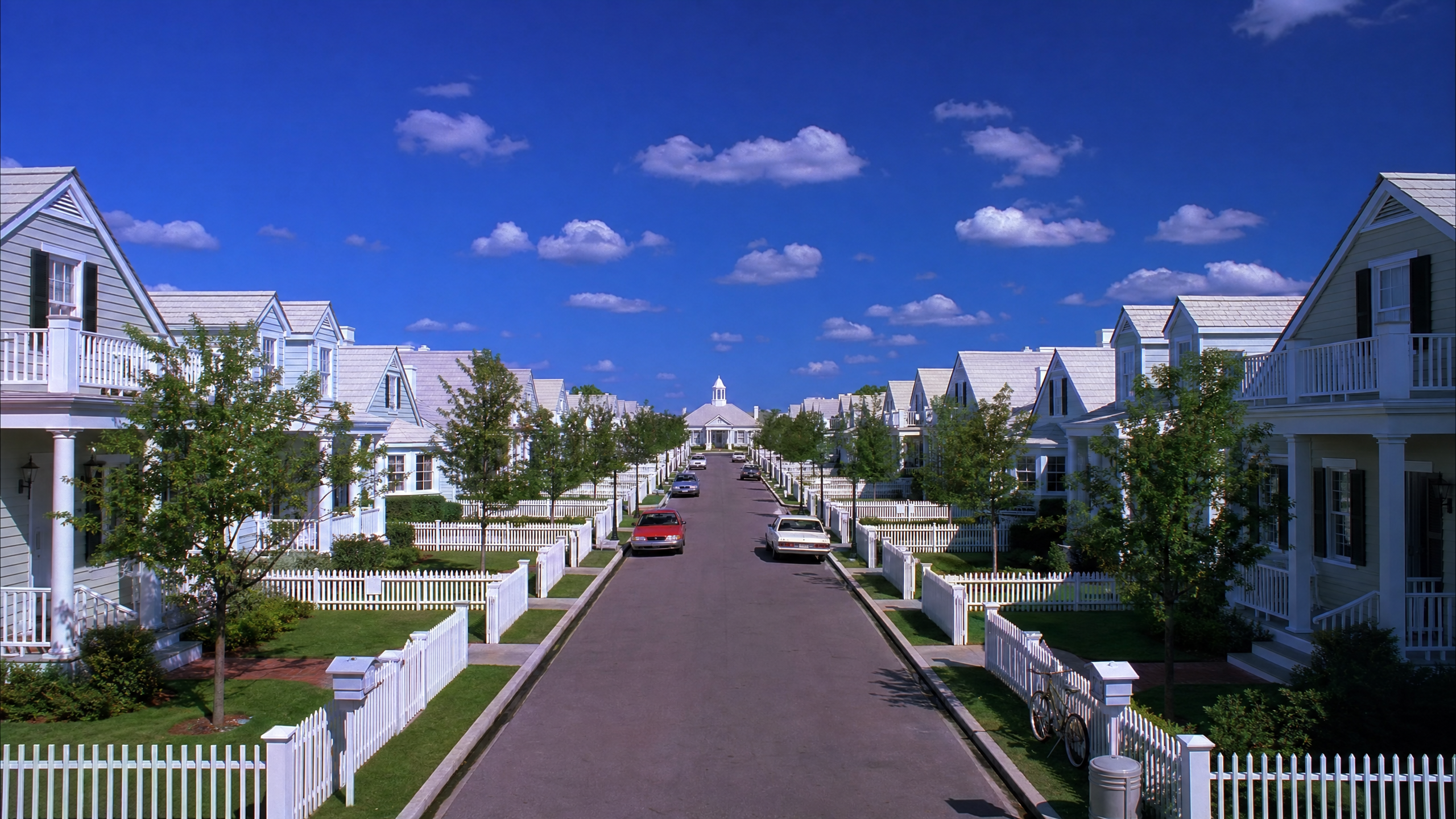 A picturesque suburban street in Seahaven that looks too perfect to be real.